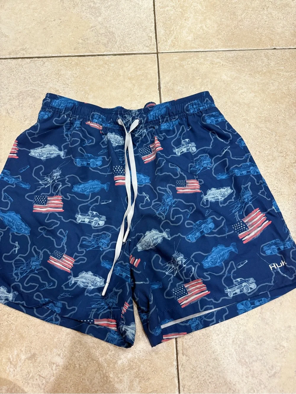 Huk Navy Blue Swim Trunks with Red & White Flag Print